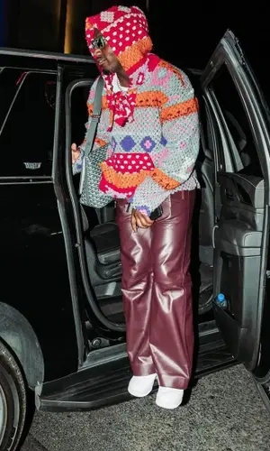 Deebo Samuel’s Outfit in Alchemist Hoodie, Goyard Bag & Louis Vuitton Eyewear (2024)