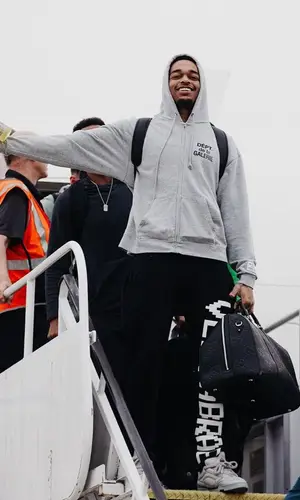 P. J. Washington wearing Louis Vuitton sneakers
