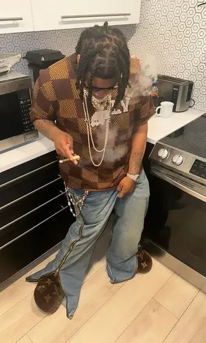 YTB Fatt’s Outfit in Louis Vuitton T-Shirt & Purple Brand Jeans (2024)