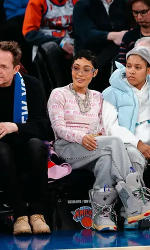 Coi Leray’s Outfit in Kenzo Jacket, Miu Miu Sweater & Balenciaga Eyewear (2024)
