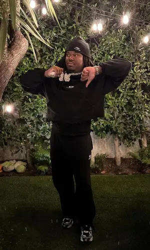 Deadboylife wearing Balenciaga sneakers