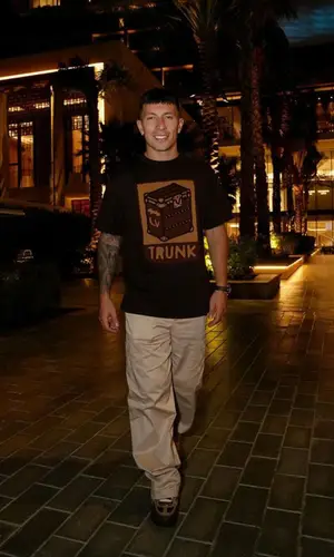 Lisandro Martinez wearing Louis Vuitton pants