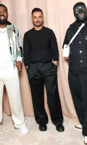 M Huncho wearing Louis Vuitton sneakers
