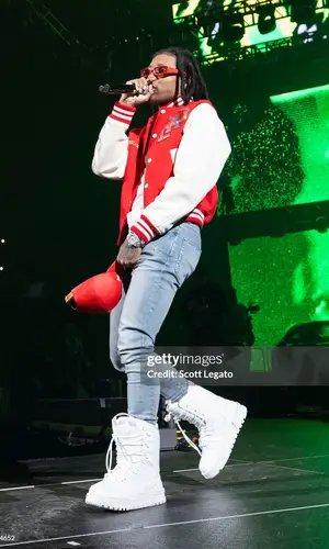 Lil Durk wearing Louis Vuitton boots