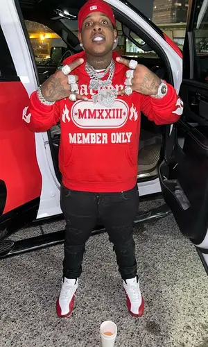 Finesse2tymes wearing Backend Original hoody