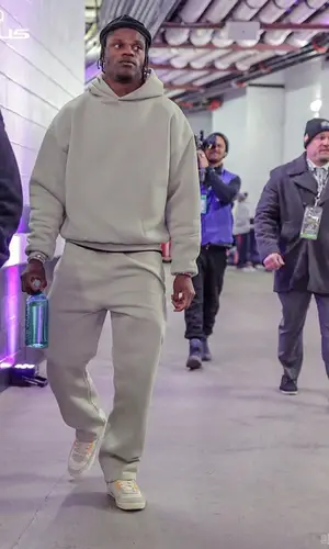 Lamar Jackson wearing Seventh Heaven pants