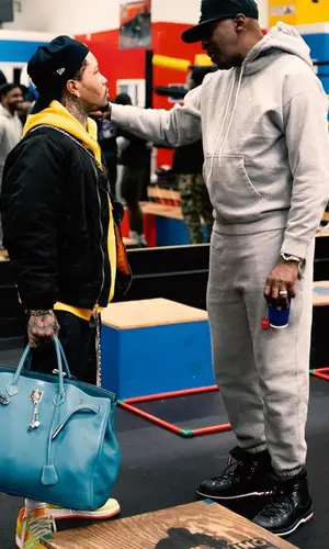 Gervonta Davis’ Outfit in Enfants Riches Deprimes Jacket, Rick Owens Shorts & New Era Cap (2024)