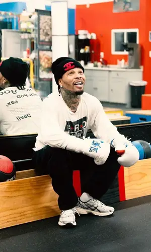 Gervonta Davis’ Outfit in Enfants Riches Deprimes T-Shirt, Asics Sneakers & Chanel Hat (2024)