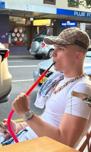 Voyage wearing Gucci cap