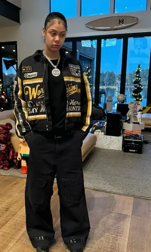 KARRAHBOOO wearing Nike sneakers