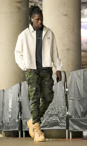Jrue Holiday wearing Amiri pants
