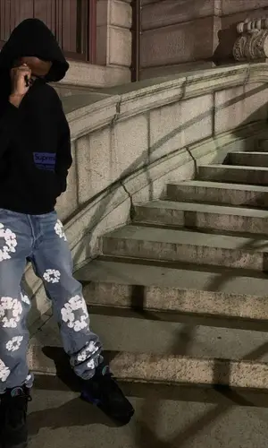 Devstacks wearing Denim Tears jeans