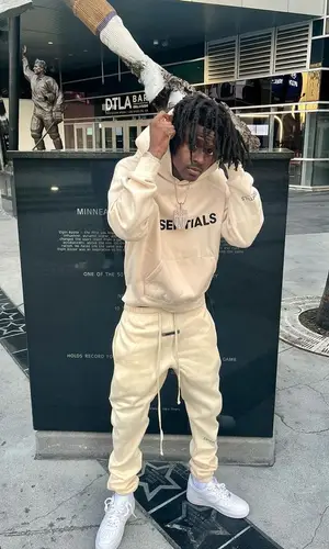 DracBaby wearing Fear of God pants