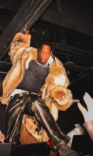 Travis Scott wearing Givenchy top