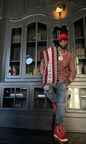Papoose wearing Lanvin cap