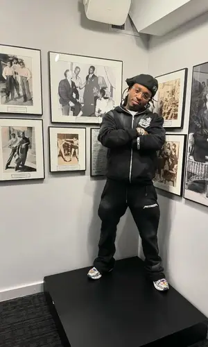 Jacquees wearing Ricchezza Forever hoody