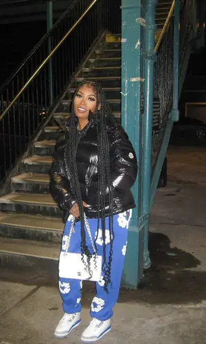 Asian Doll wearing Moncler jacket
