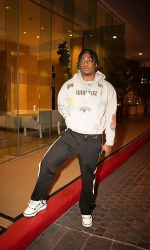 Fredo Bang’s Outfit in Amiri Sneakers & Rhude Cap (2024)