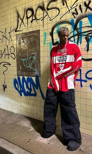 DC The Don’s Outfit in Vetements Jersey & Prada Boots (2024)