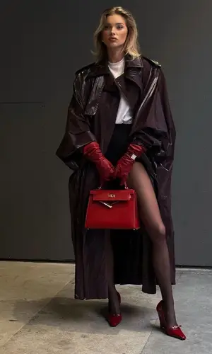 Elsa Hosk’s Outfit in Saint Laurent Jacket, Magda Butrym Shorts & Hermes Bag (2024)