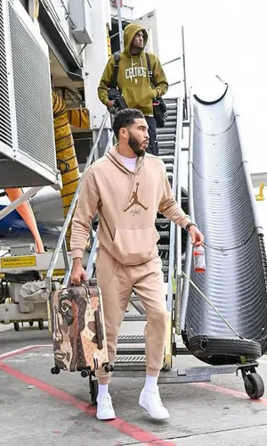 Jayson Tatum’s Outfit in Jordan Hoodie & Louis Vuitton Bag (2024)