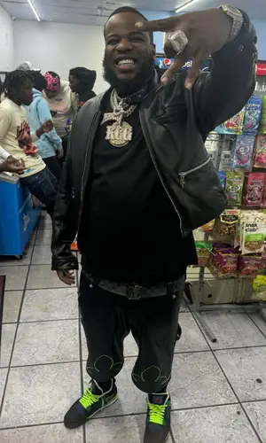 Maxo Kream’s Outfit in Chrome Hearts Jacket, Jordan Sneakers & Louis Vuitton Belt (2024)