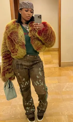 Dess Dior’s Outfit in Who Decides War Pants, Rick Owens Sneakers & Hermes Bag (2024)