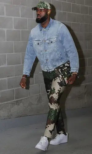 LeBron James’ Outfit in Nike Sneakers & Louis Vuitton Cap (2024)