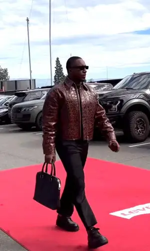 Deebo Samuel’s Outfit in Louis Vuitton Boots, Bottega Veneta Bag & Rick Owens Eyewear (2024)