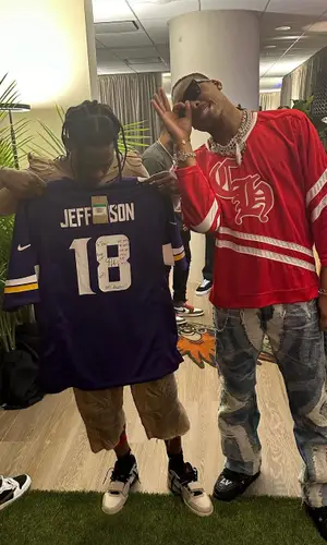 Justin Jefferson wearing Louis Vuitton sneakers