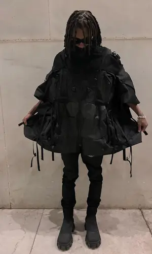 Yung Kayo wearing Junya Watanabe jacket
