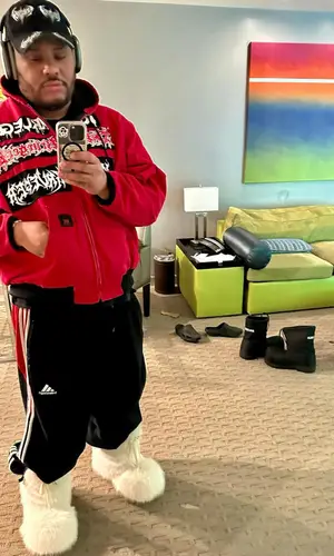 Wakeupf1lthy wearing Balenciaga boots