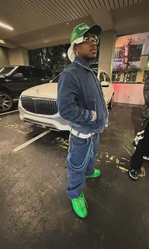 DaBaby wearing Louis Vuitton belt