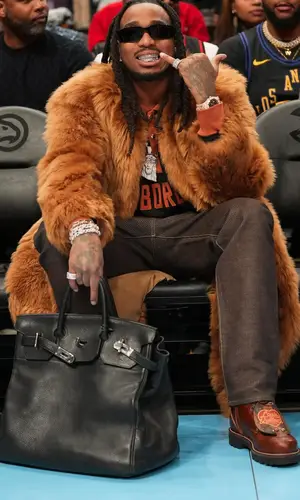Quavo wearing Louis Vuitton boots
