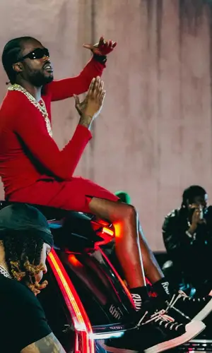Meek Mill’s Outfit in Rick Owens Eyewear & Rhude Socks (2024)