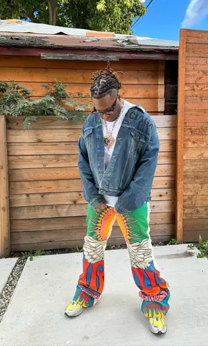 Tay Keith’s Outfit in Balenciaga Jacket, Cout De La Liberte Pants & New Balance Sneakers (2024)