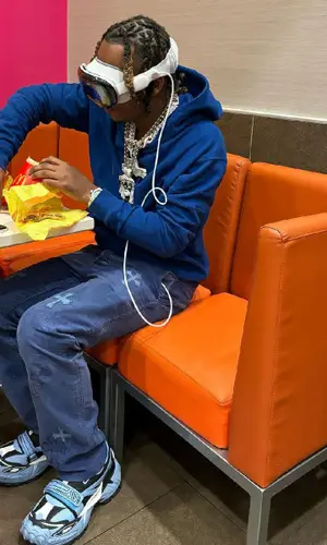 Rich The Kid wearing Chrome Hearts pants