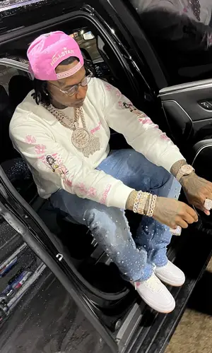 Moneybagg Yo wearing Hellstar cap