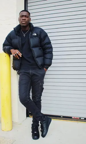Foggieraw wearing Stone Island pants