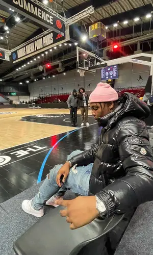 Kaza wearing Moncler hat