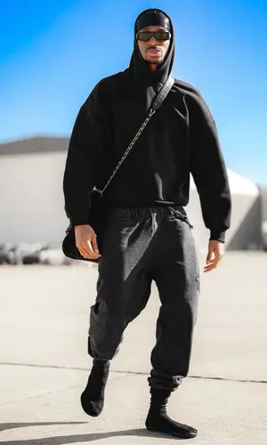 Shai’s Outfit in Chanel Bag, Louis Vuitton Eyewear & Nigo (2024)