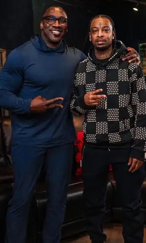 21 Savage wearing Louis Vuitton hoody