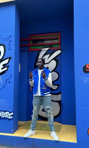 J1mulla wearing Nike sneakers