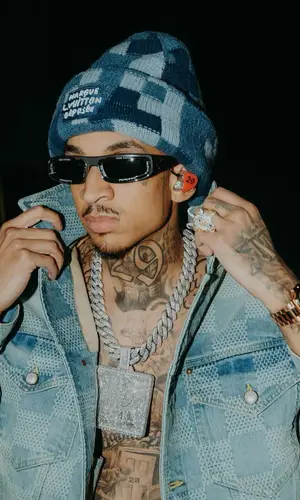 Young Adz wearing Louis Vuitton hat