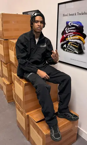 Nemzzz wearing Drama Call jacket