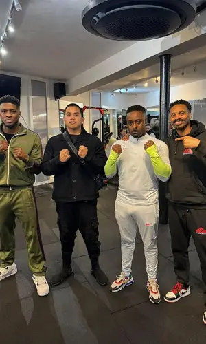 Swarmz wearing Palm Angels jacket