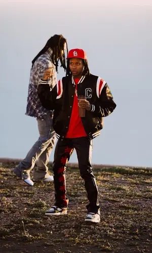 Lil Durk wearing New Era cap