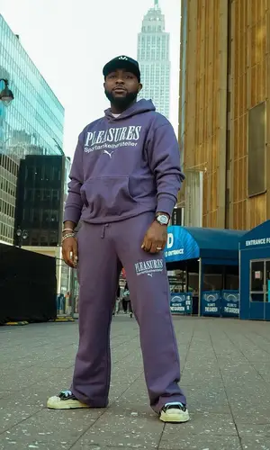 Davido’s Outfit in Puma Hoodie, New Era Cap & Pleasures (2024)