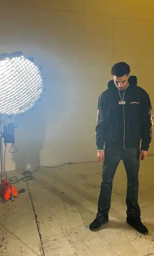 Jay Critch’s Outfit in Chrome Hearts Hoodie, Purple Brand Trousers & Jordan Sneakers (2024)