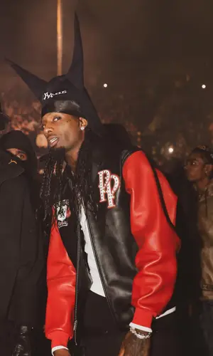 Playboi Carti wearing No Name belt